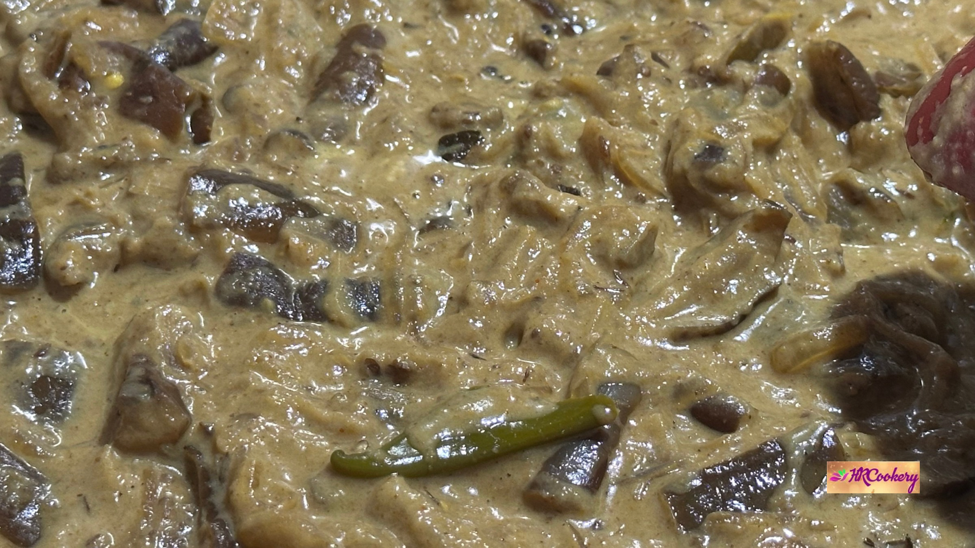 Sri Lankan eggplant coconut milk curry with tender brinjal simmered in a creamy coconut gravy and green chilies.