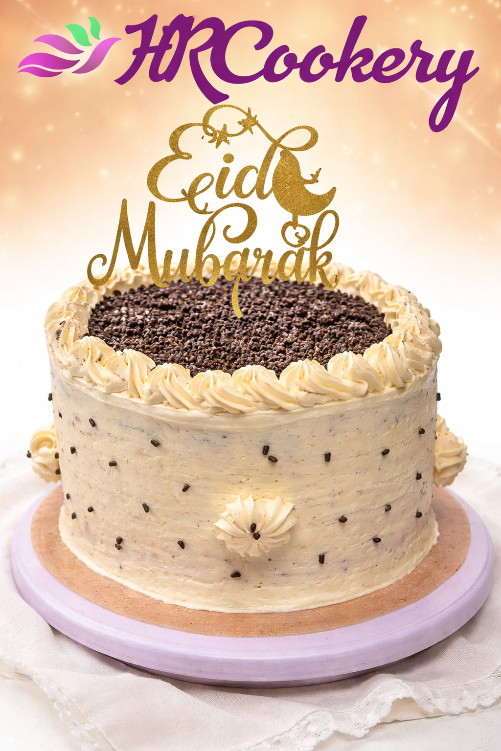 Black velvet cake with vanilla Swiss meringue buttercream frosting decorated with chocolate chips and a gold Eid Mubarak topper