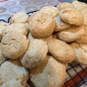 Freshly baked keto cottage cheese cookies cooling on a wire rack